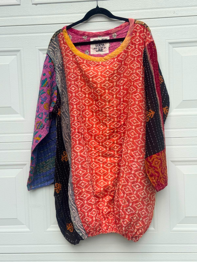 This is a handmade, patchwork, quilted Kantha stitch kimono jacket made from recycled saris.